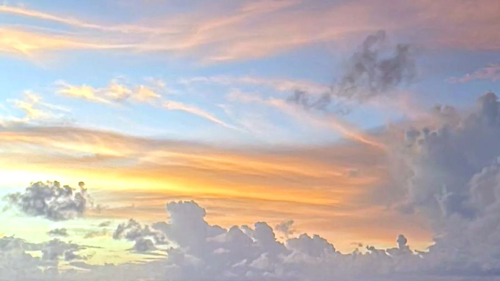 Sunset sky over the ocean at Induruwa