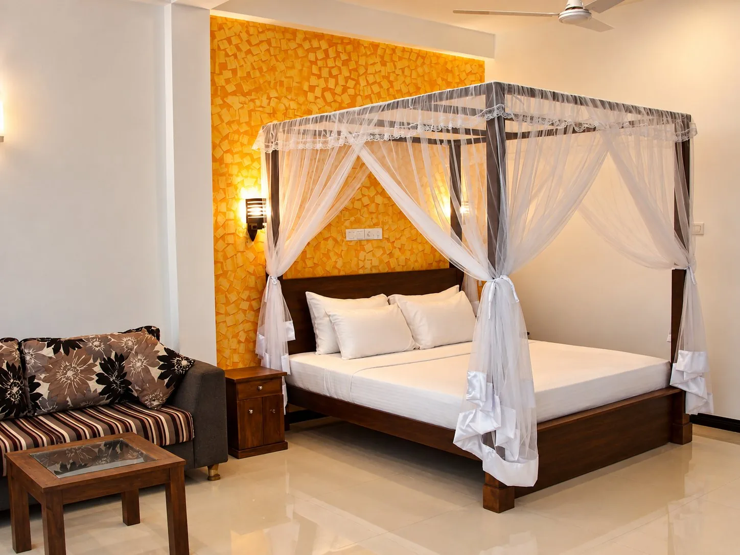 Garden Suite canopy bed and sitting area